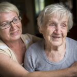 bigstock-An-elderly-woman-with-her-adul-131370128-1.jpg