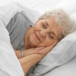 bigstock-Elderly-woman-sleeping-in-bed-175715944.jpg