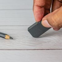 bigstock-Eraser-And-Error-Concept-Hand-329010229.jpg