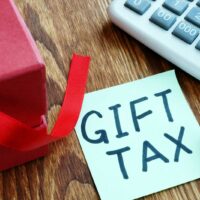 bigstock-Gift-Tax-Written-On-Piece-Of-P-279665080-1.jpg