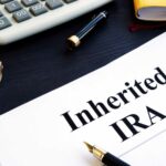 bigstock-Inherited-Ira-Documents-On-A-T-269314111-1.jpg