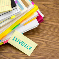 bigstock-Invoice-The-Pile-Of-Business-206701705.jpg