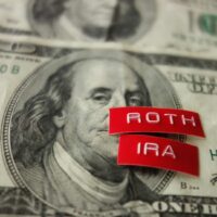 bigstock-Roth-Ira-Label-On-A-Hundred-Do-273057178.jpg