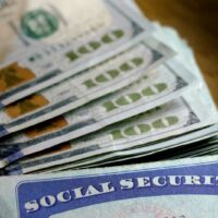 bigstock-Social-Security-cards-with-cas-282810331.jpg