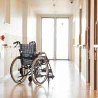 bigstock-Wheelchair-in-the-corridor-of-326010865.jpg