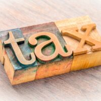 bigstock-tax-word-abstract-in-letterpre-224407144.jpg